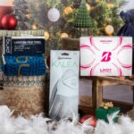 Dāvanu komplekts golfa spēlētājiem - golfa dvielis Ping G Le, ducis bumbiņu Bridgestone Precept Ladies Pink, dāmu cimds Kalea